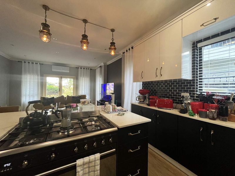 This stunning freestanding 3-bedroom family home in Seaward Estate, Ballito offers the perfect blend of coastal luxury, space, and modern convenience. - Photo 5