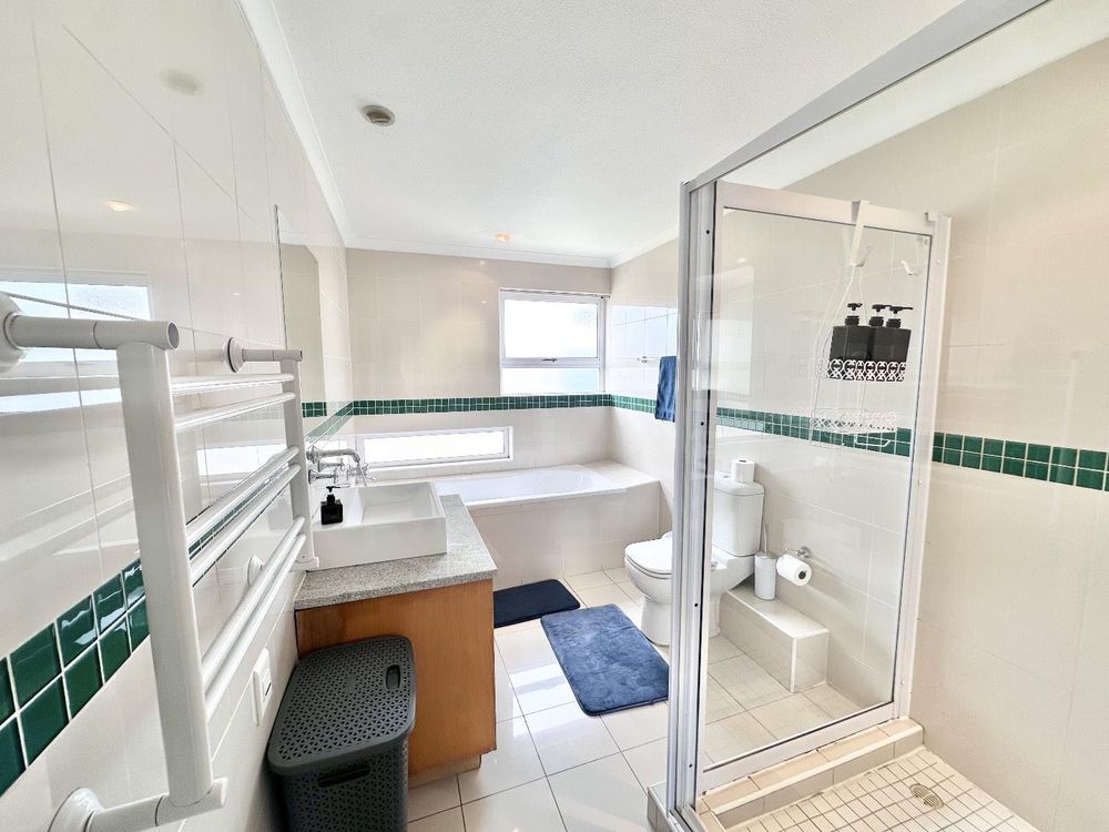 Guest bathroom with shower and bath