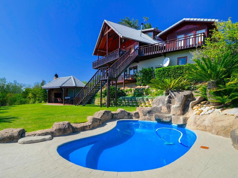 Perched Above the Rest: Modern Luxury with Panoramic Eagle Views - Photo 3