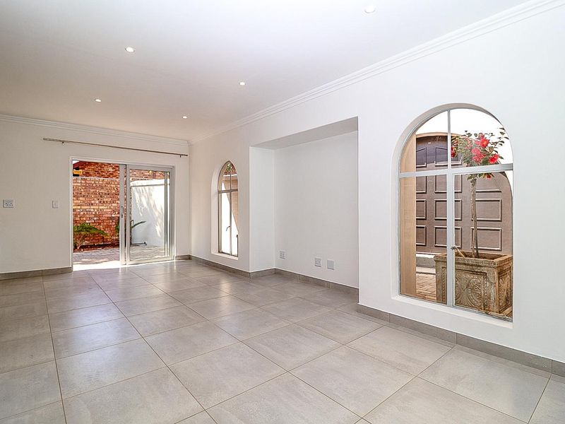 Modern Comfort Meets Secure Garden Living! - Photo 3