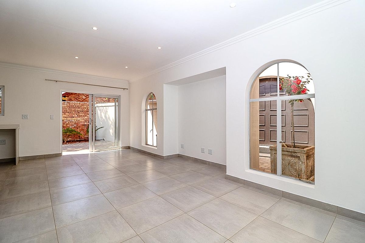 Modern Comfort Meets Secure Garden Living! - Photo 3