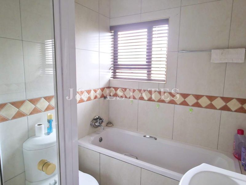 Well-Maintained 3-Bedroom Unit - Photo 8