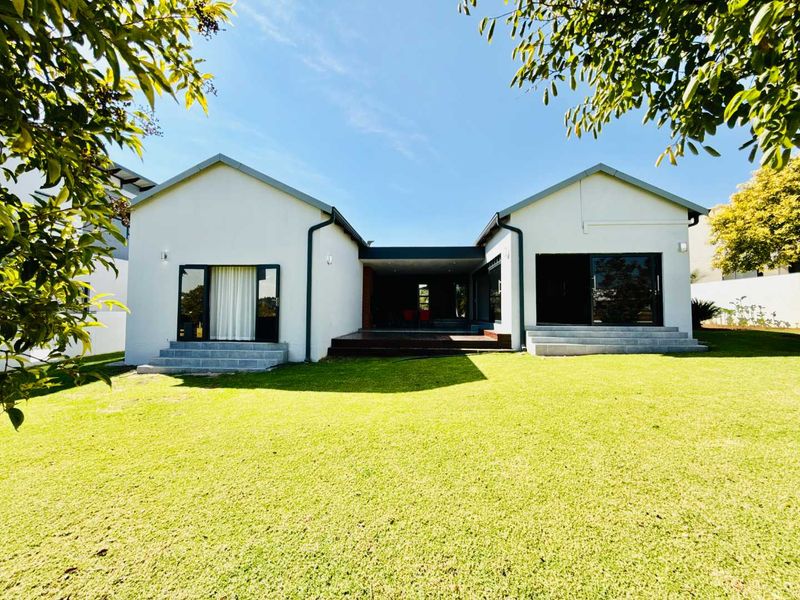 Modern Single-Level Family Home on the Green Belt in Copperleaf Golf Estate - Photo 2