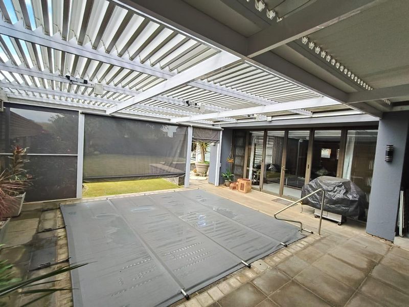 Luxury Living with Income-Generating Flatlet, Heated Pool & Full Solar Power! - Photo 4