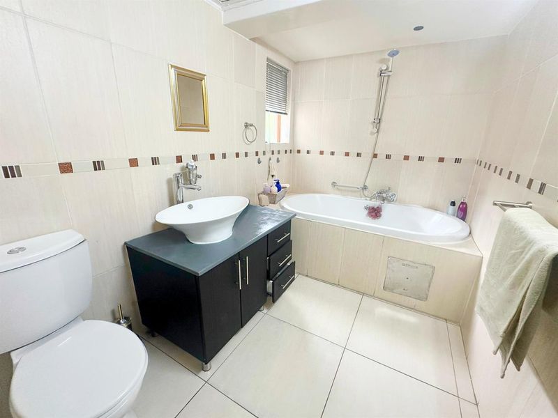 Spacious 2-Bedroom Unit with Patio - Photo 10