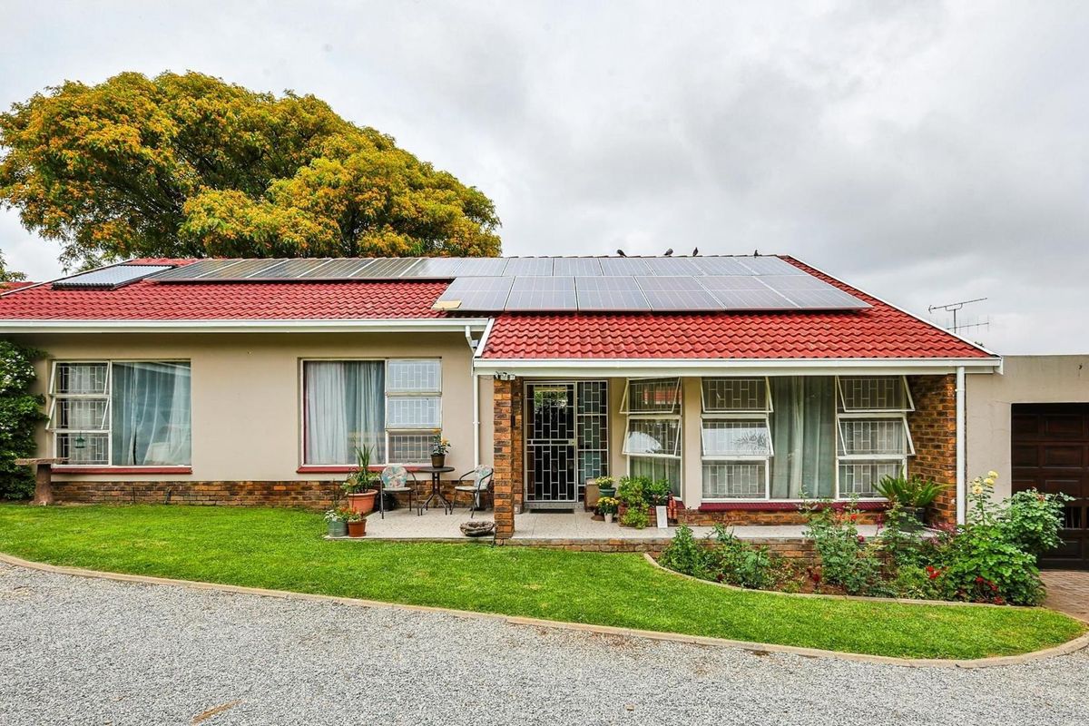 Family Home with Flatlet, Solar Power, and Pool in Sought-After Rooihuiskraal - Photo 4