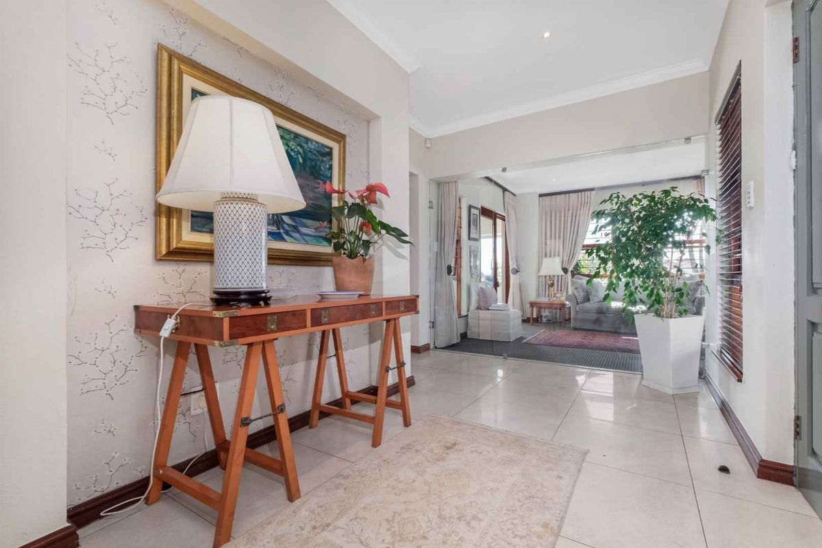 STRIKING AND SOPHISTICATED FAMILY HOME IN A SOUGHT AFTER QUIET AND SERENE LOCATION - Photo 5