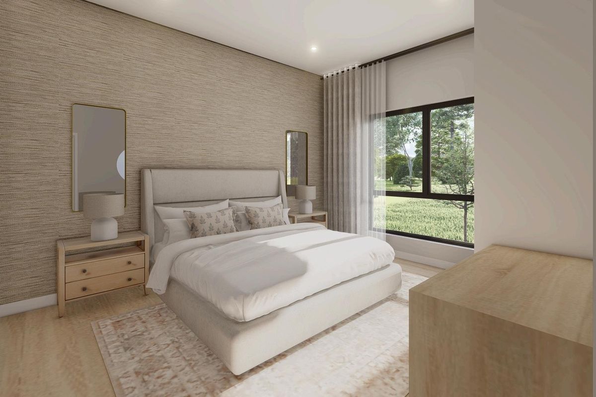 A modern, well-lit bedroom featuring neutral textured wallpaper, large windows with garden views, and contemporary finishes.