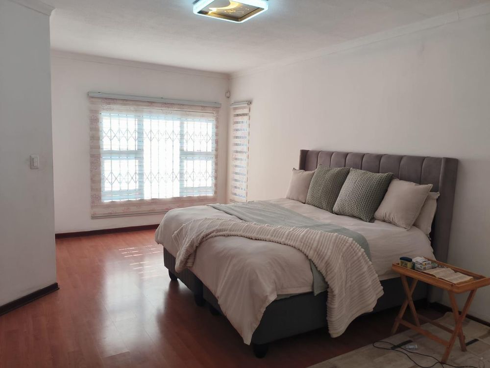Main bedroom with spacious walk in cupboard