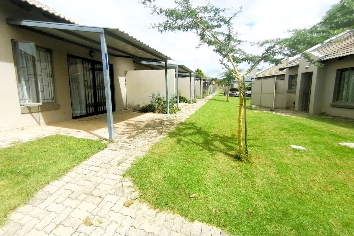 Charming 2-bedroom Cluster House - Photo 3