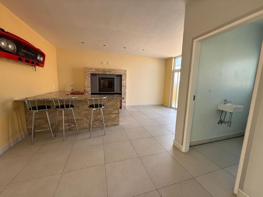 Entertainment area, guest WC and fireplace