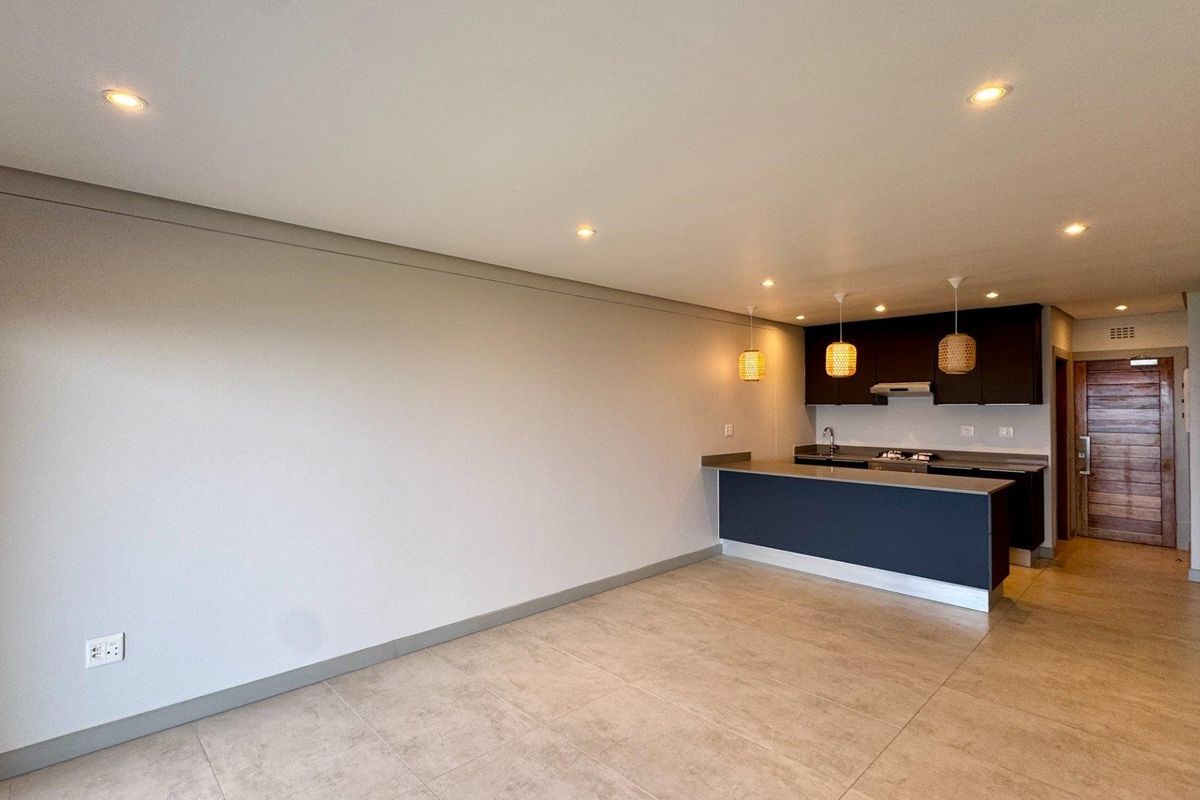 This brand-new, never-before-lived-in apartment offers a refined coastal lifestyle with breathtaking panoramic sea views and sleek, modern finishes throughout - Photo 3