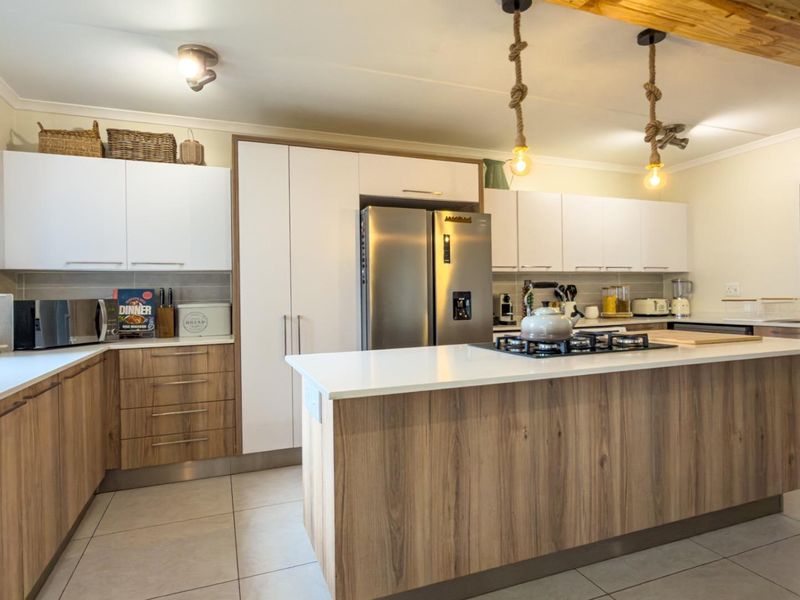 This home is ideal for young families, first time buyers, or anyone looking for a modern, move in ready property in one of Centurion most desirable estates. - Photo 3