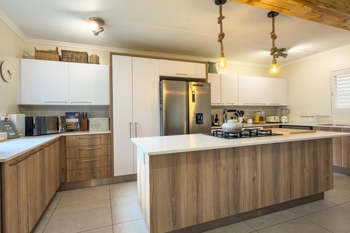 This home is ideal for young families, first time buyers, or anyone looking for a modern, move in ready property in one of Centurion most desirable estates. - Photo 3