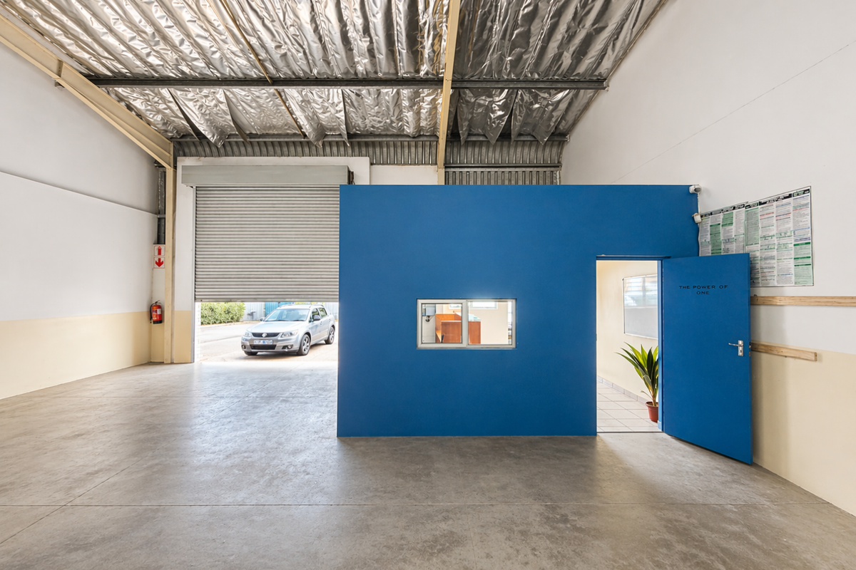 Neat Industrial Unit with Roller Door Access and Reception Office - Photo 5