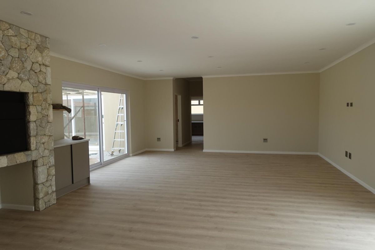 BRAND-NEW FAMILY HOME IN THE TRANQUIL ROSSMUND GOLF VILLAGE - Photo 2