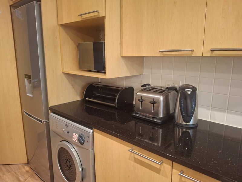A BEAUTIFULLY FURNISHED TWO BEDROOM APARTMENT - Photo 10