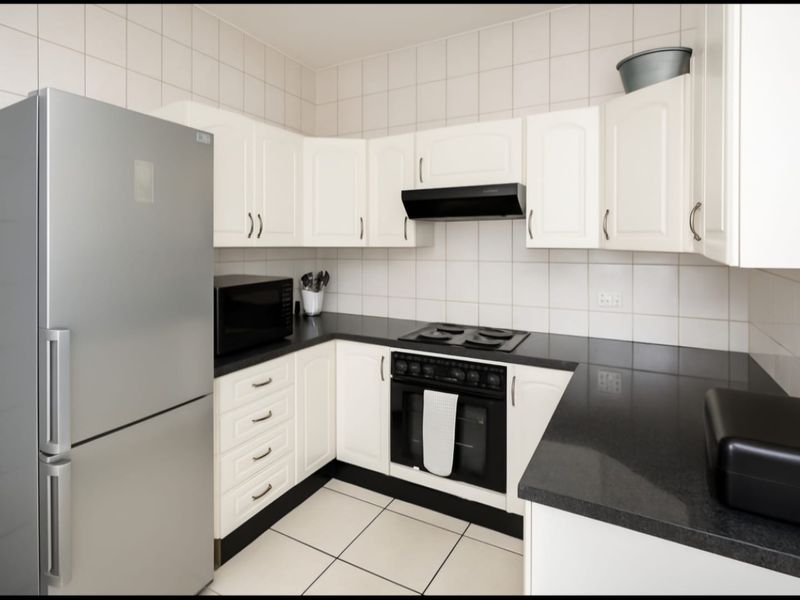 First-Floor 2-Bedroom Apartment with Enclosed Balcony - Photo 9