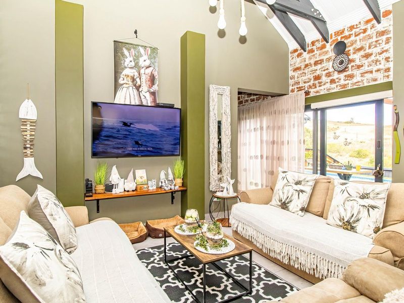 An entertainer's paradise nestled on a sprawling stand, offering a lifestyle that seamlessly blends comfort and luxury. - Photo 7