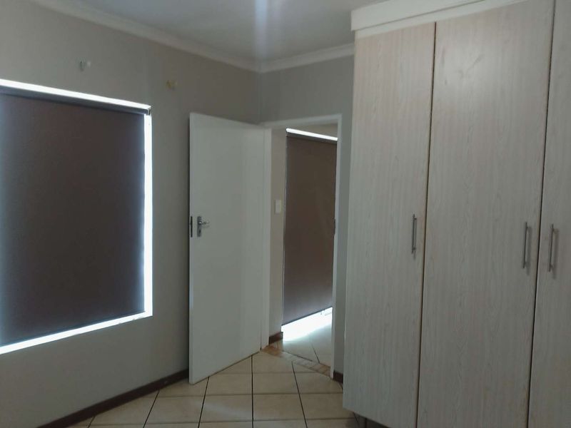 "Sleek Comforts and Security: Your Ideal Lock-Up Apartment!" - Photo 8
