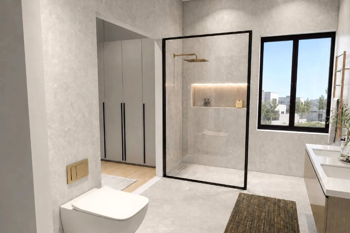 Modern bathroom featuring a walk-in shower with black frame, double vanity, wall-hung toilet, and integrated storage, finished with contemporary fixtures and neutral tiling.
