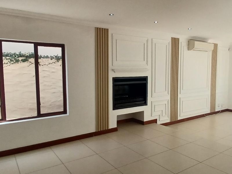 Modern Elegance in a Secure and Sought-After Estate - Photo 7