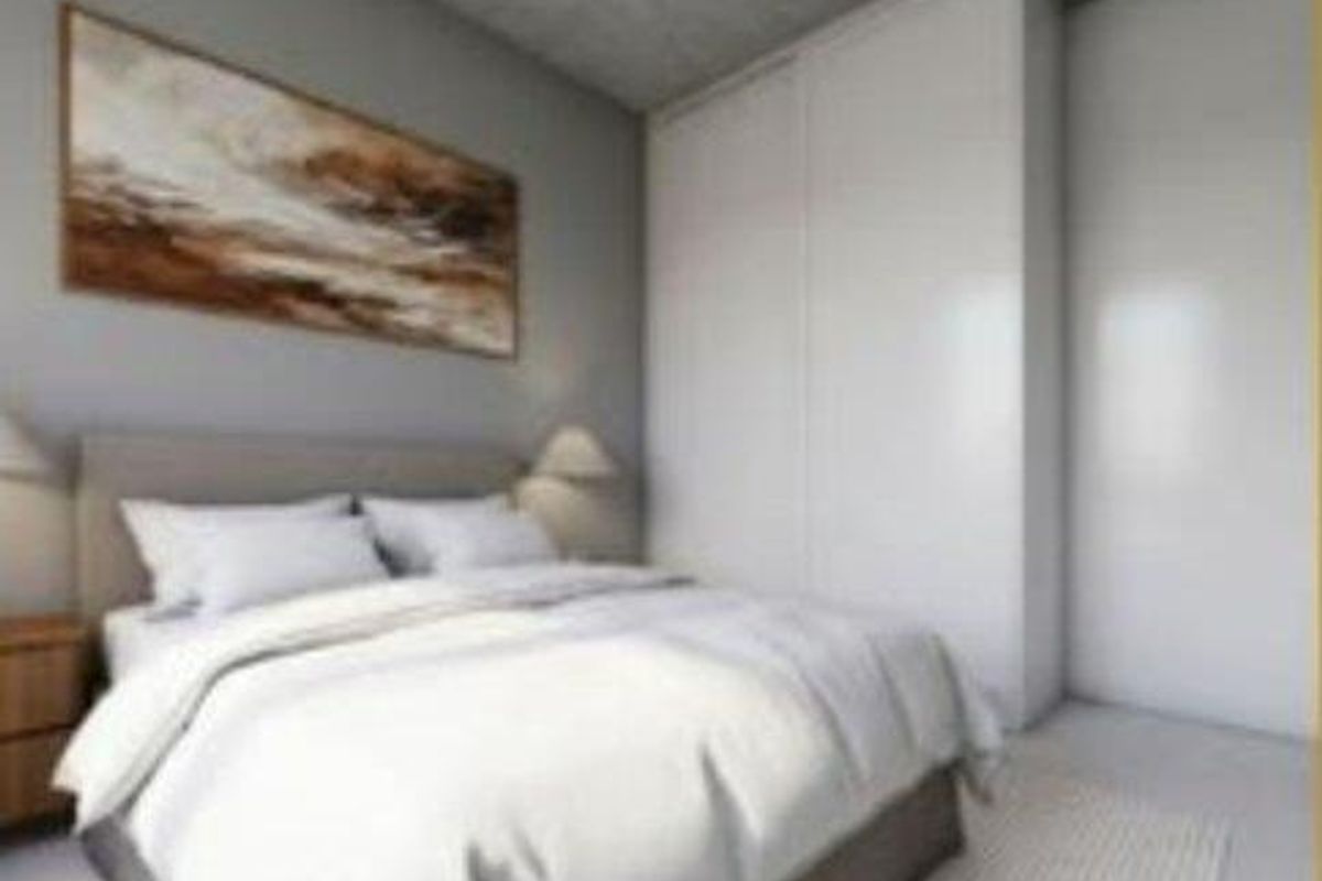 A composite image showing a modern bathroom and a bedroom interior, likely from a property listing advertisement.