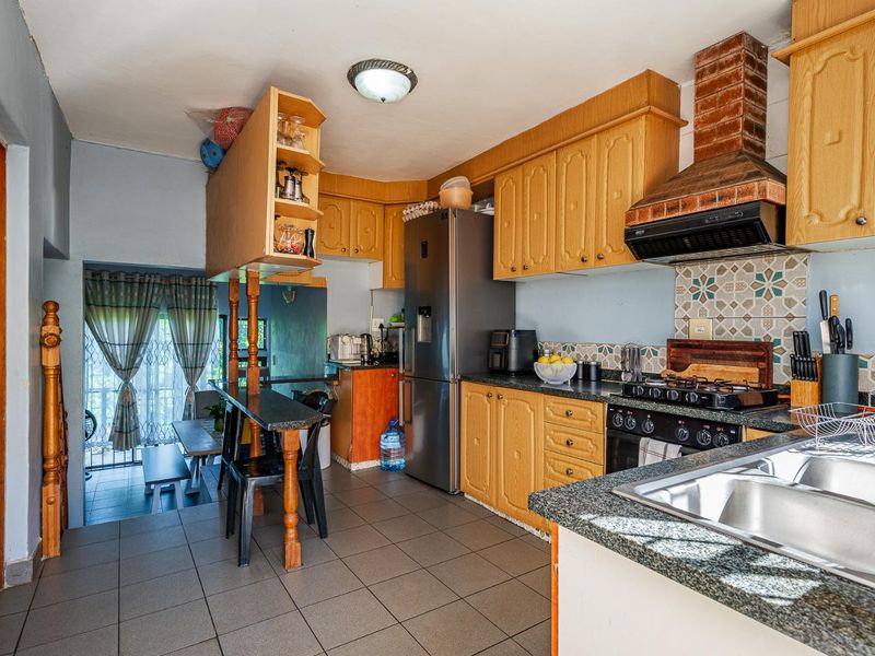 Spacious Hillside Townhouse with Scenic Views & Great Potential - Photo 6