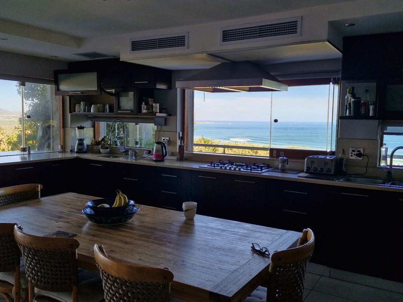 Exclusive Mountside Sanctuary: Breathtaking Chapman’s Peak, Valley & Ocean Views - Photo 10