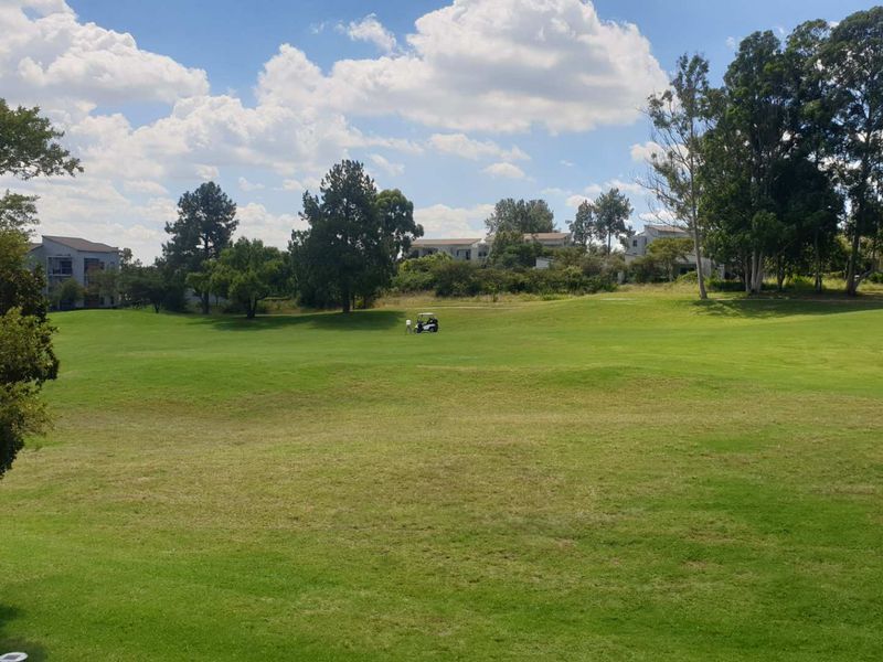 Swing Into Style: Sunlit 1st Floor Haven with Designer Kitchen in Golf Estate - Photo 9