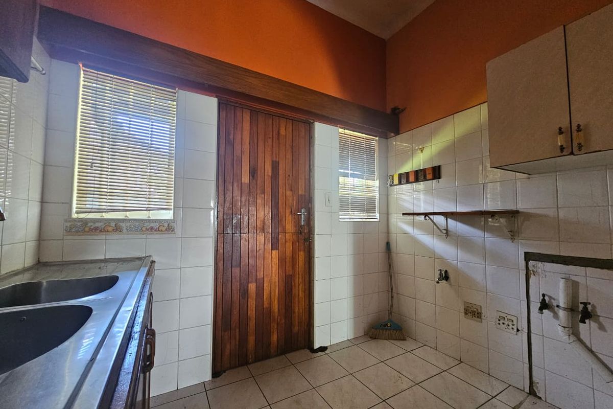 Bargain Fixer-Upper with Bonus Bachelor Flat – A Golden Opportunity! - Photo 4
