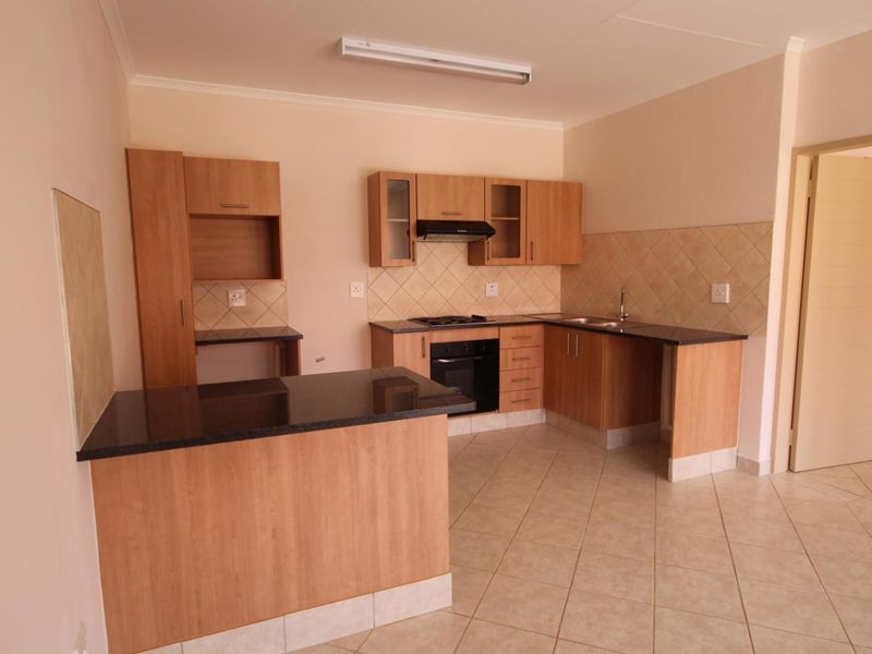 Secure & Stylish Living: 1-Bed in Elardus Park! - Photo 2