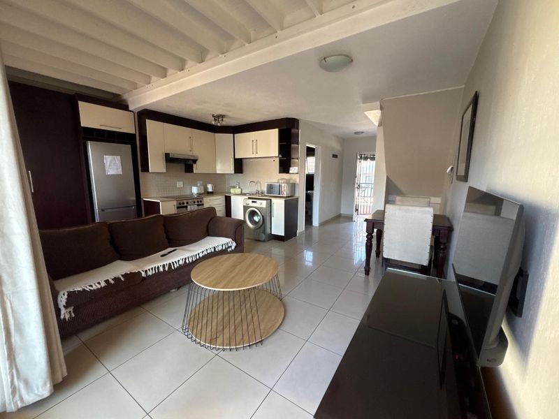 A STUNNING ONE BEDROOM FURNISHED DUPLEX - Photo 8
