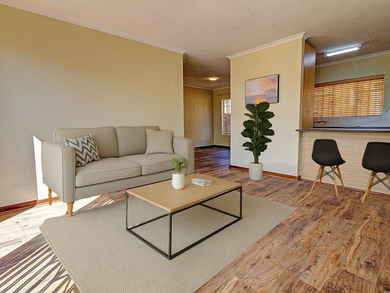 Bright Newly Painted Home with New Laminated Floors! - Photo 2