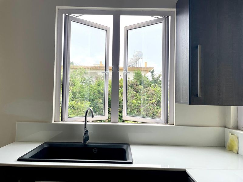 An Exceptional Villa with Outstanding Potential, Blending Contemporary Elegance and Tropical Living - Photo 8