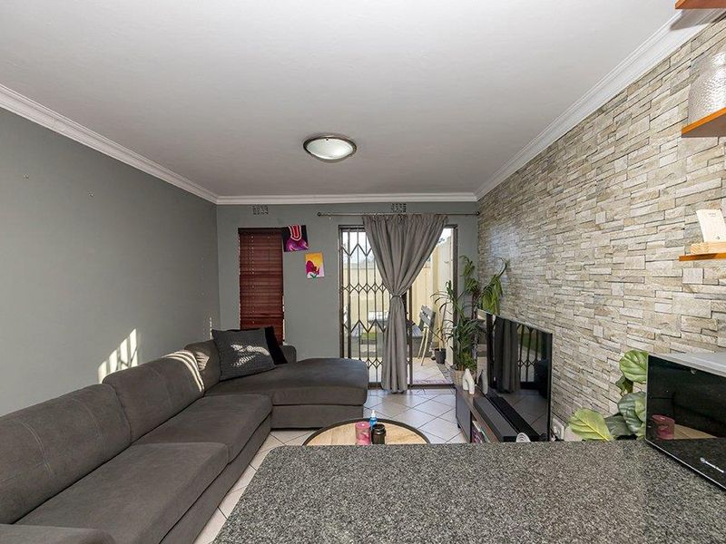 Secure Ground Floor Living with a Private Patio - Photo 2