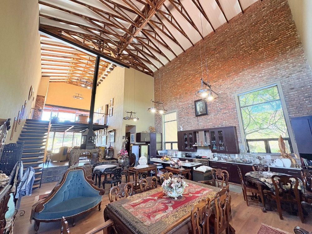 Open plan living, dining and kitchen area.