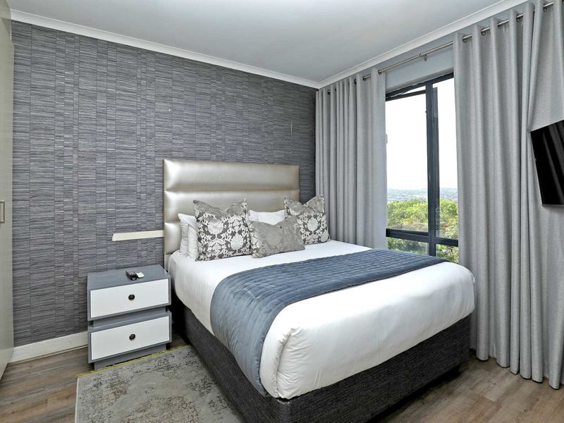 Stylish and Secure 2 bedroom Furnished apartment at The Cube Rivonia! - Photo 7