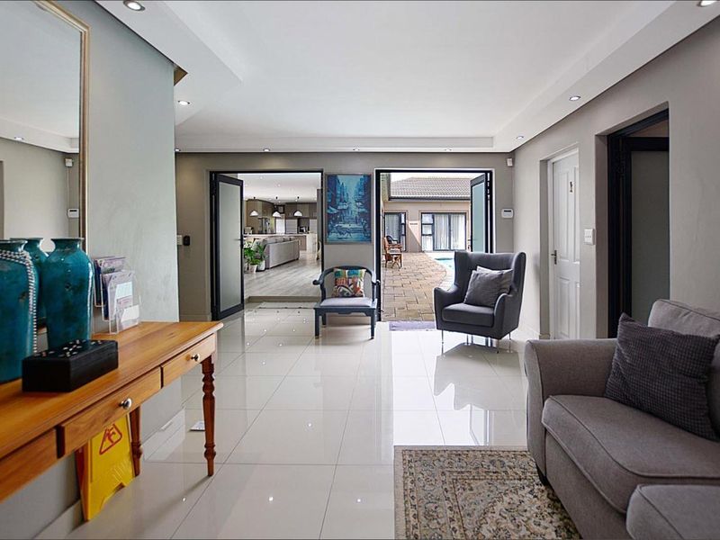 Exceptional 5-Bedroom Home with Versatile Studio in Flamingo Vlei - Photo 9