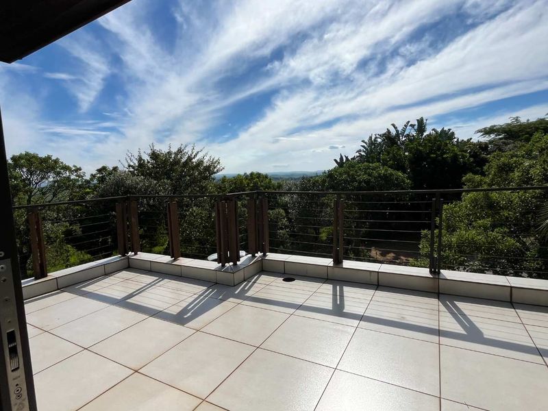 Charming 3-Bedroom Duplex in Zimbali with  Distant Sea Views - Photo 4