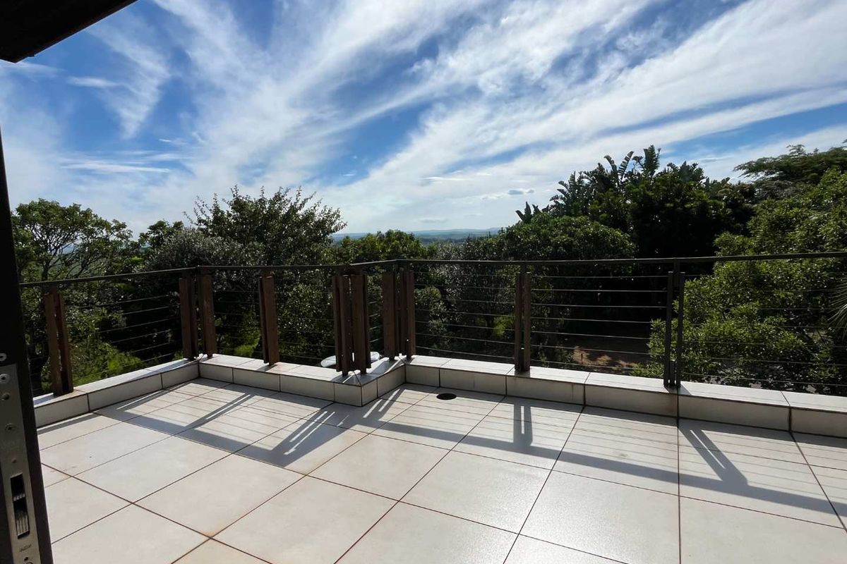 Charming 3-Bedroom Duplex in Zimbali with  Distant Sea Views - Photo 4