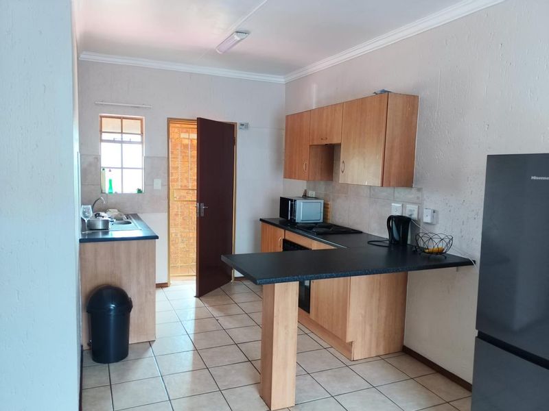 2 bed 2nd floor unit in 24h security complex, close to East rand Mall - Photo 3