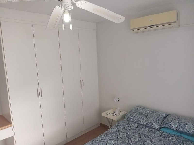 Charming 2-Bedroom Simplex with Modern Comforts & Complex Pool - Photo 3