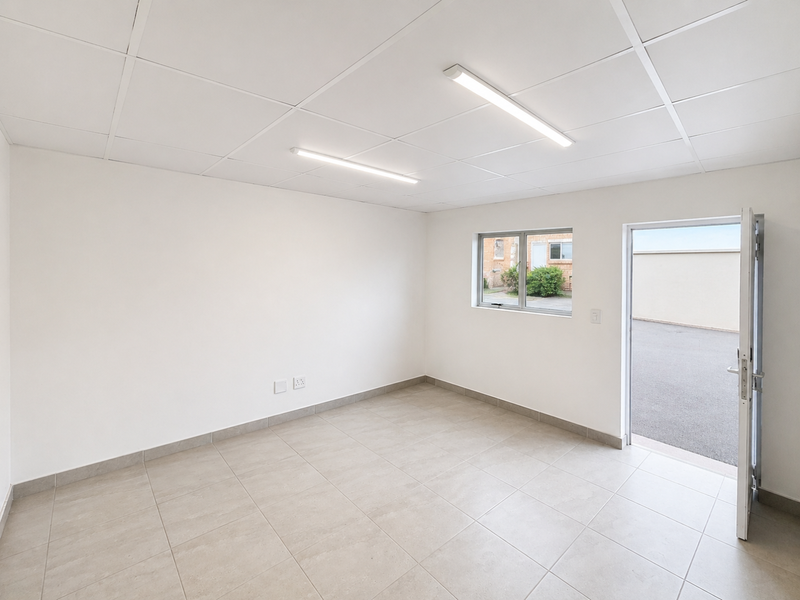 Spacious Industrial Unit with Roller Door Access - Photo 2