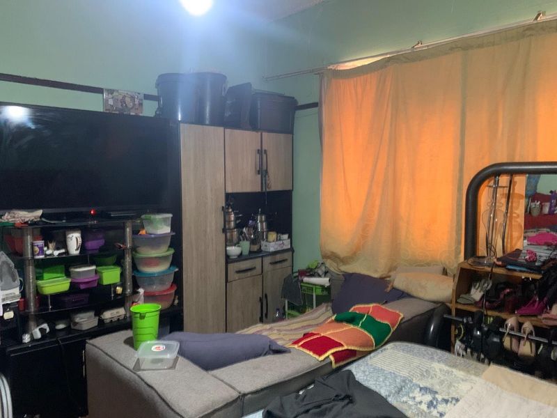 **Charming 3/4 Bedroom Family Home in Prime Location – A Must-See Investment Opportunity - Photo 4