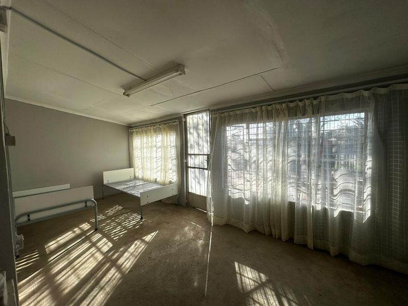 Spacious 3-Bedroom Home with Huge Erf in Peaceful Dealesville - Photo 4