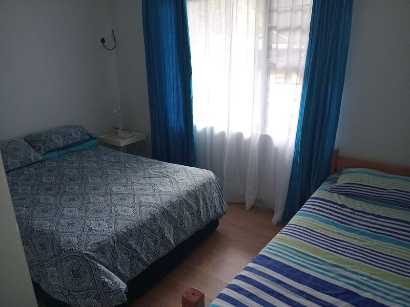 Charming 2-Bedroom Simplex with Modern Comforts & Complex Pool - Photo 4