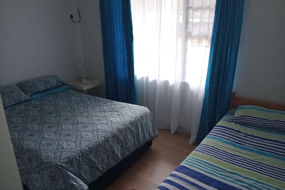 Charming 2-Bedroom Simplex with Modern Comforts & Complex Pool - Photo 4