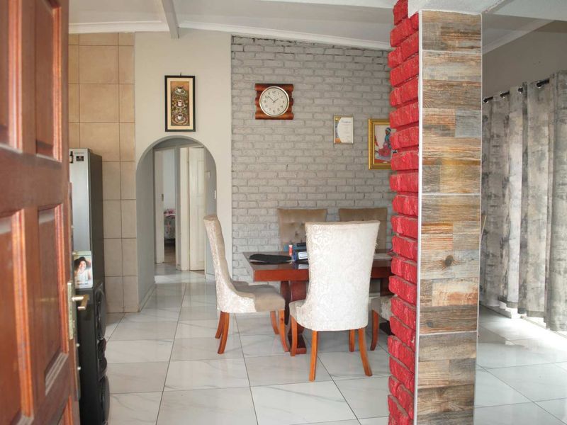 Feast your eyes on this charming facebrick property — a place you’ll be proud to call home. - Photo 3