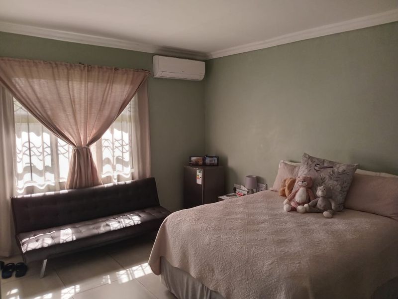 Step into comfort and modern convenience with this beautifully presented 3-bedroom home, perfectly designed for easy living. Fully tiled throughout, this home o - Photo 7